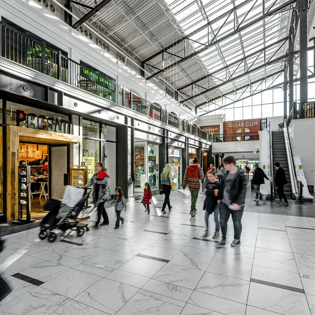 Shoppers walking around inside Easton's Station Building.