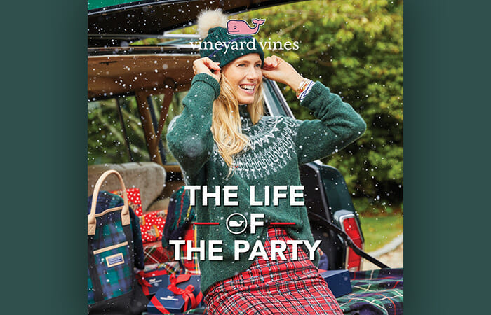 A woman wearing vineyard vines clothing and promotional copy that reads The Life of the Party.