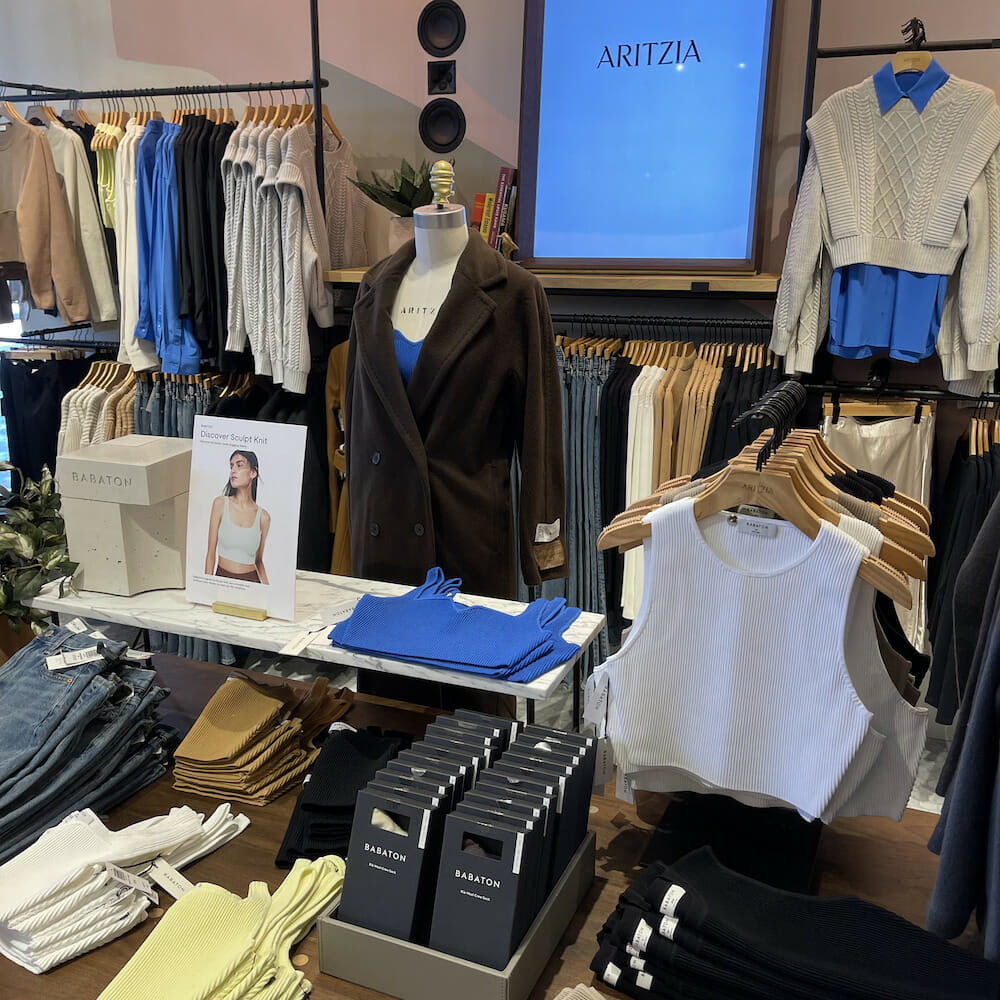 Clothes on display inside Aritzia at Easton Town Center. 