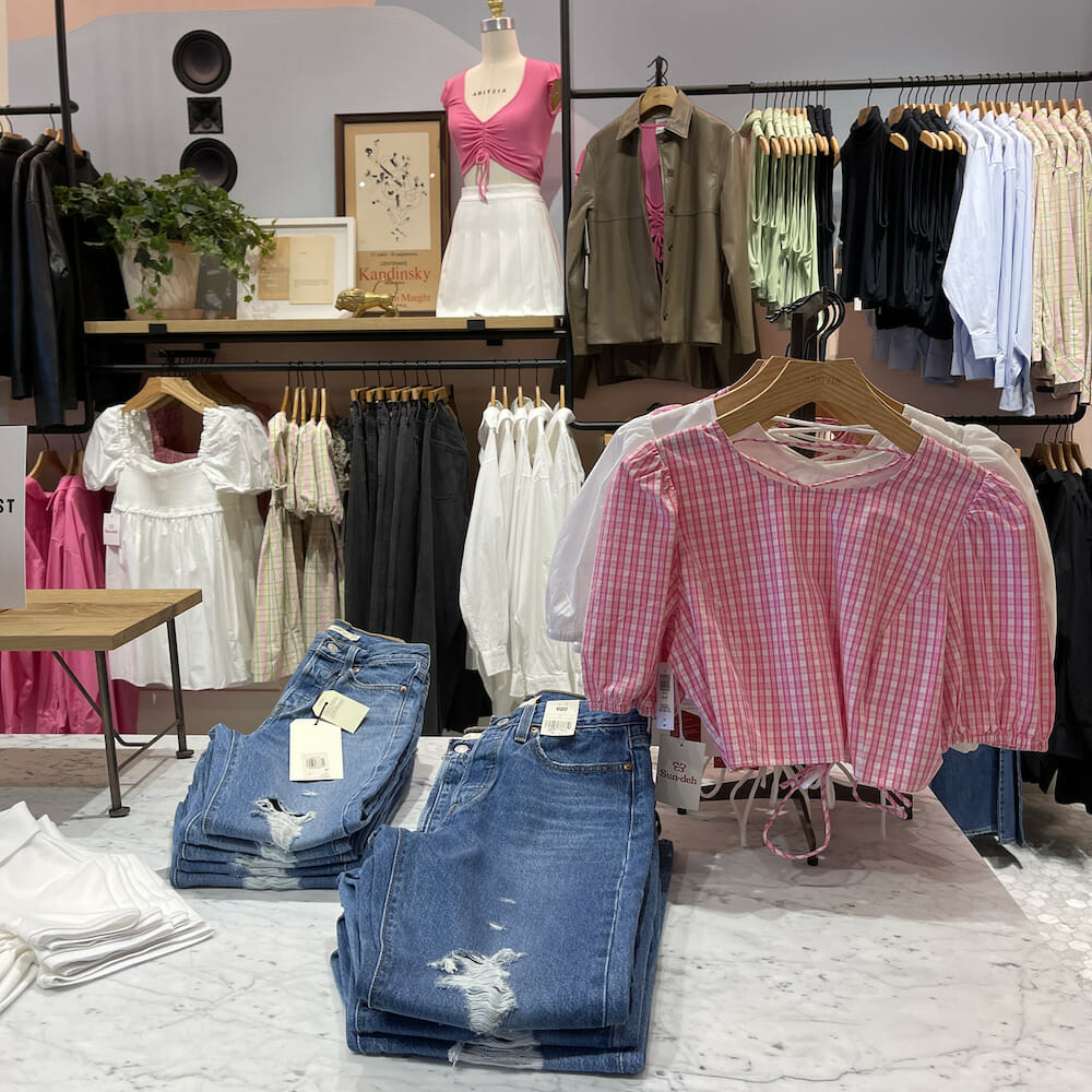 Clothes on display inside Aritzia at Easton Town Center. 
