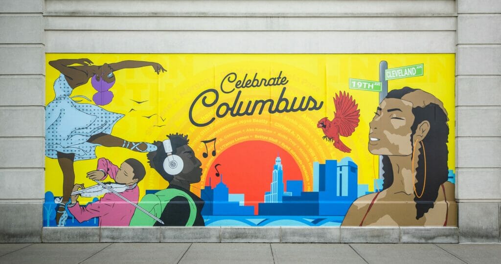 The Celebrate Columbus mural at Easton, located on Regent Street. The mural features four African American artists with details of music, dance, and other ort mediums and a partial skyline of Columbus painted in the background.