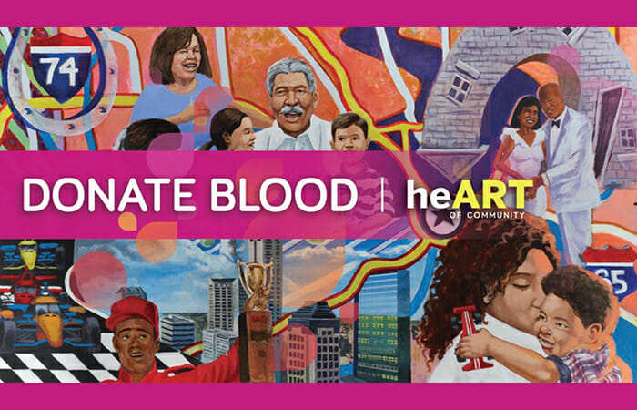 An artistic mural of paintings of people with promotional copy that reads Donate Blood with the heART logo.