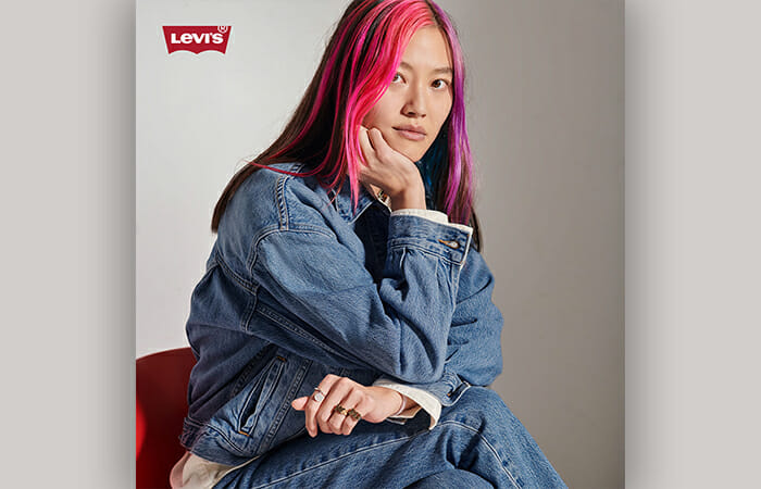 A woman wearing Levi's clothing.