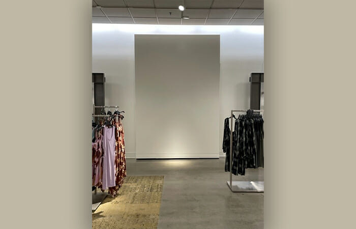 A blank canvas on a wall at Nordstrom.