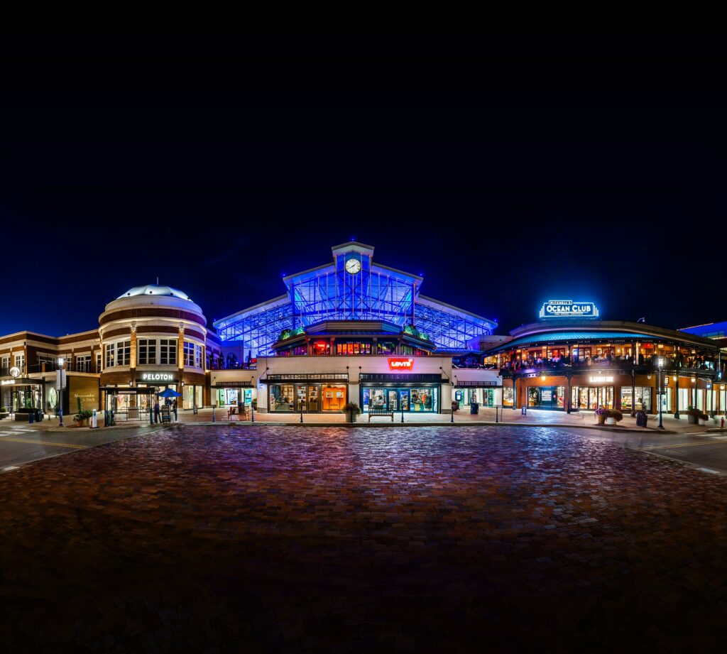 Exterior of the Station Building at Easton Town Center at night.