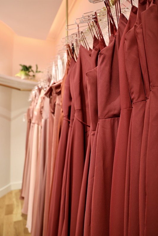 Bridesmaid dresses hanging in the boutique