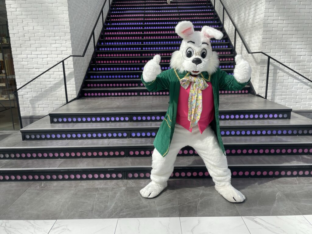 The Easton Easter Bunny in front of the Grand Staircase.