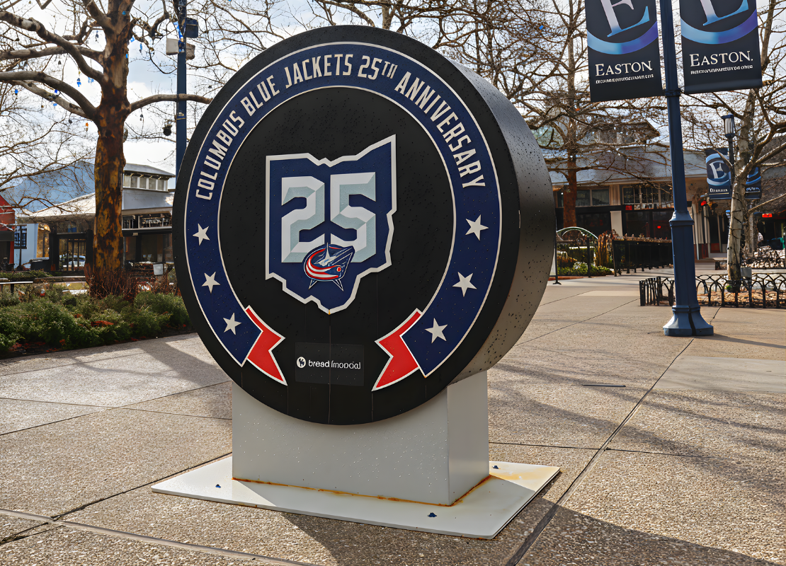 Large puck statue outside at Easton Town Center decorated for the 25th Anniversary of the Columbus Blue Jackets