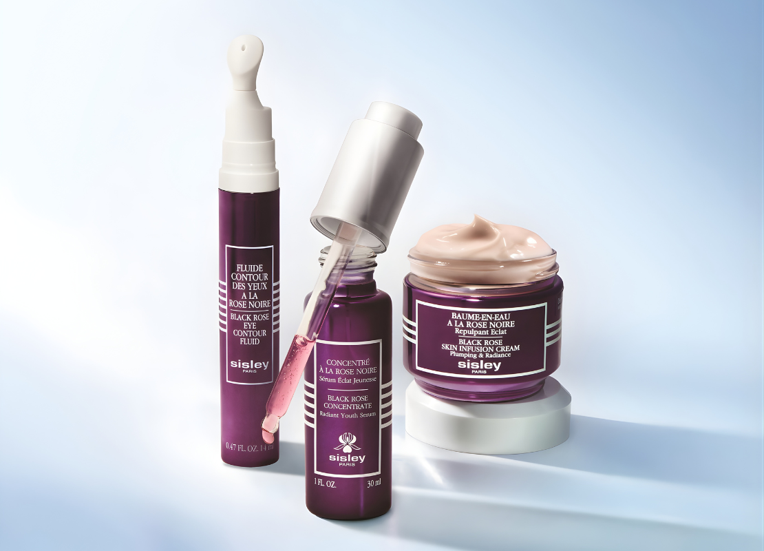 Makeup products in purple containers.