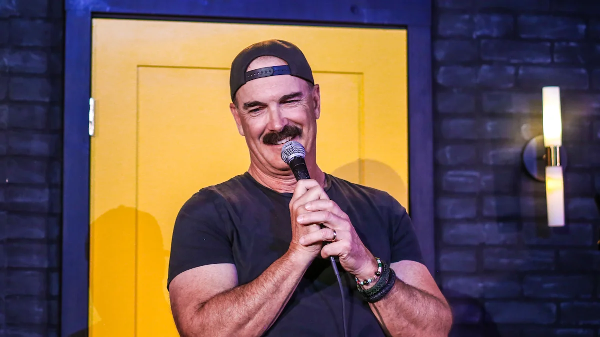 patrick warburton performing standup comedy on stage